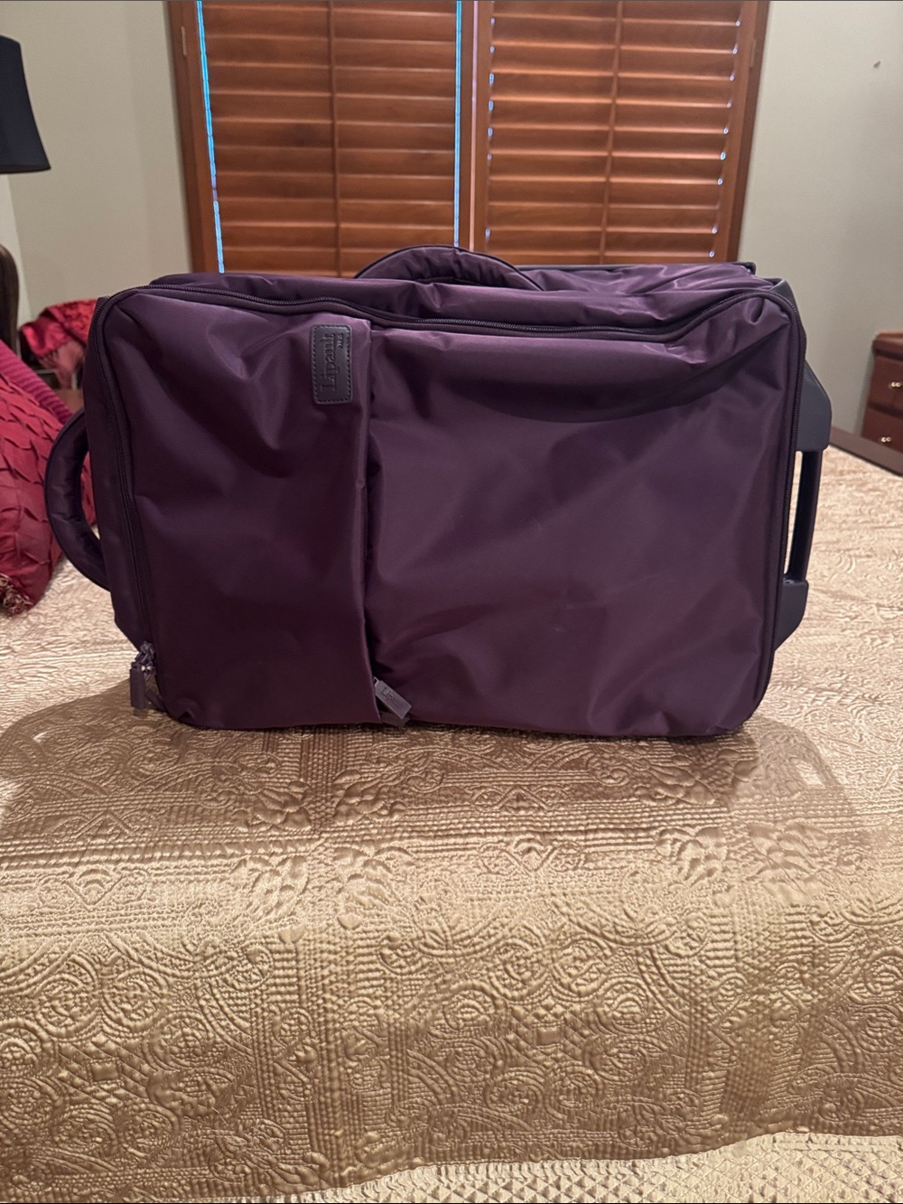 Lipault Men or Wonen’s Rolling Duffel in Deep Plum